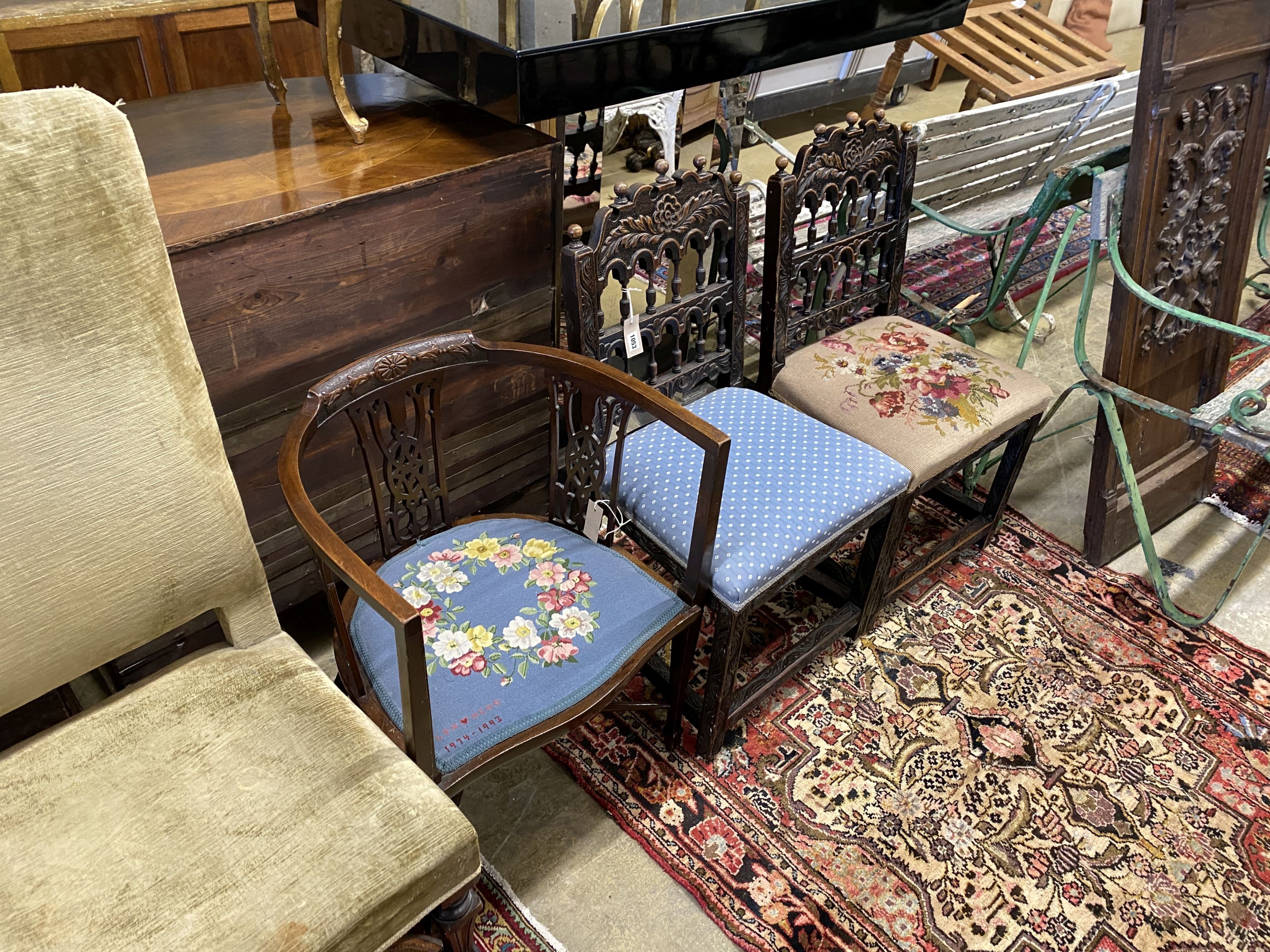 A pair of Scandinavian carved oak side chairs, embroidered seat, together with an Edwardian mahogany tub framed elbow chair